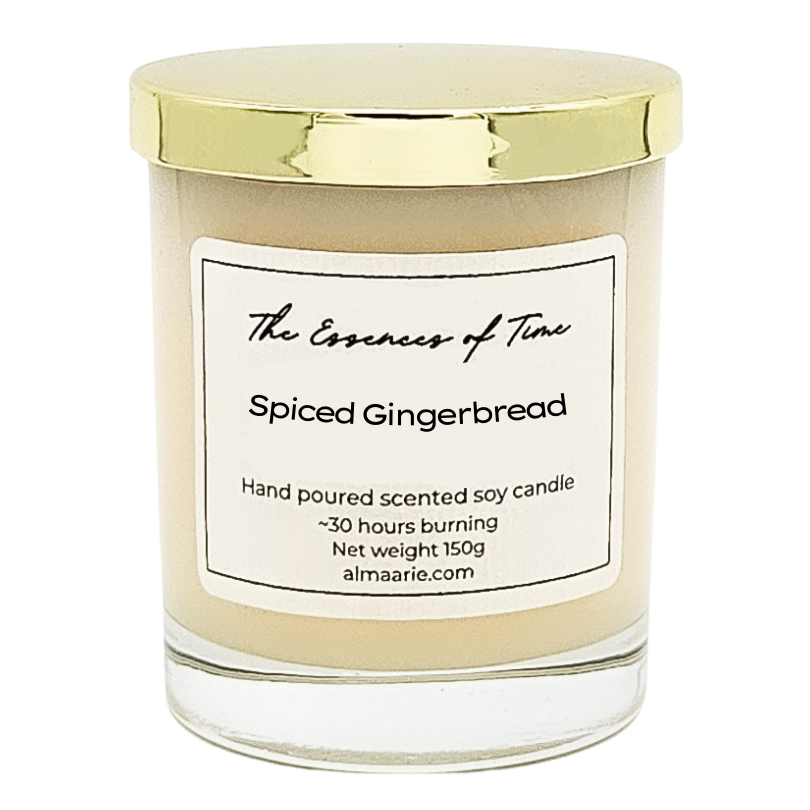 Spiced Gingerbread scented soy candle in a clear glass ar with gold lid.